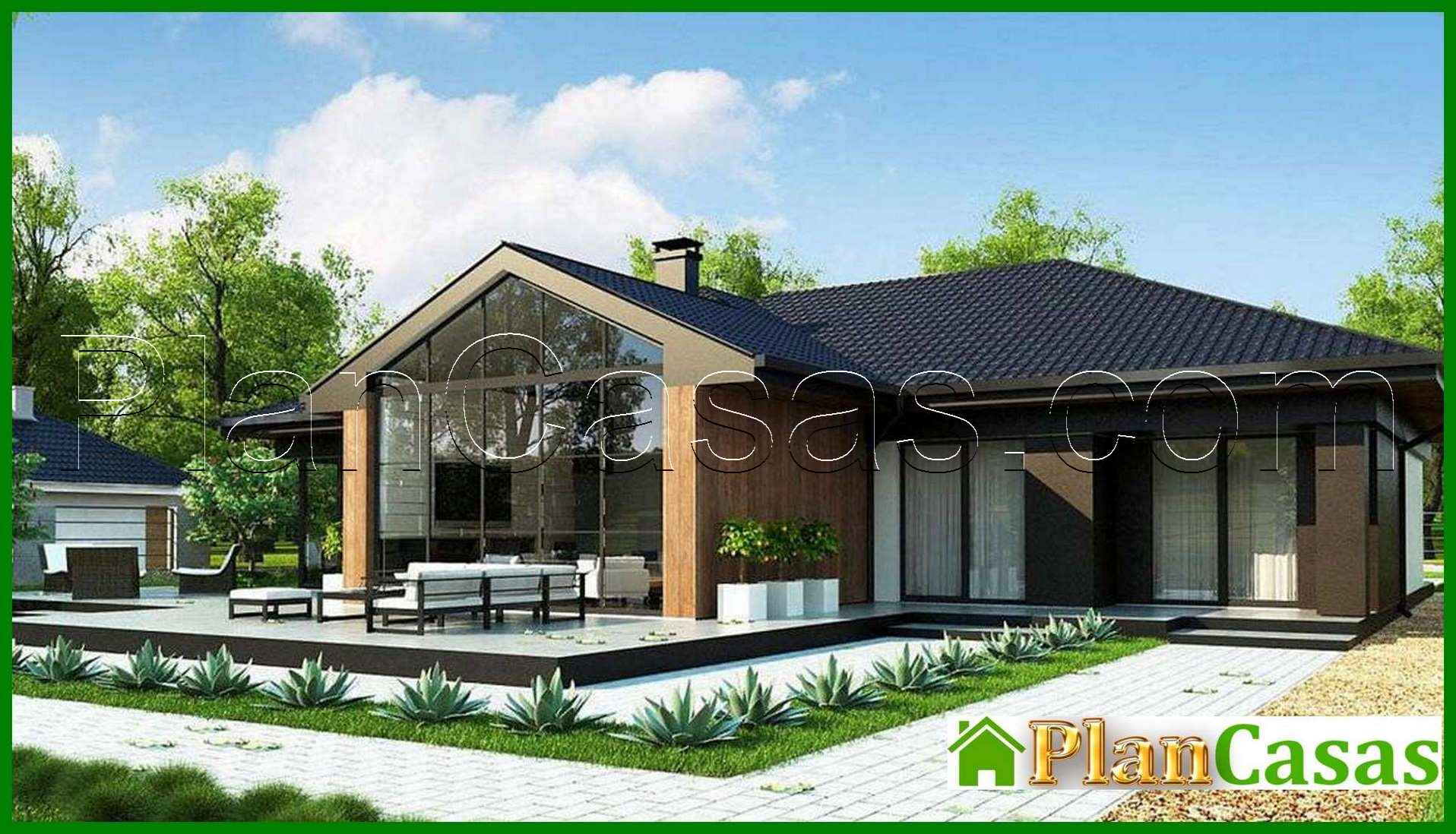 Project of an attractive cottage on 246 square meters. m with a spacious living room and stained-glass windows house plan